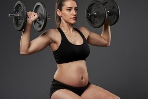 pregnant lady lifting weight